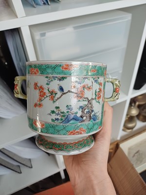 Lot 27 - A Chinese famille-verte double-handled 'floral' pot and cover, Qing dynasty, Kangxi period