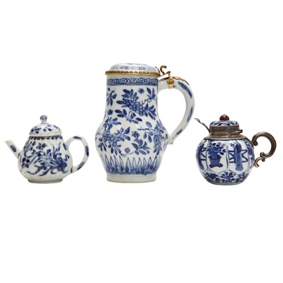 Lot 189 - A Chinese blue and white teapot, mustard pot and a tankard, Qing dynasty, Kangxi period