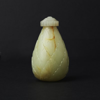 Lot 99 - A Chinese pale celadon jade 'leaves' bottle and cover, Qing dynasty