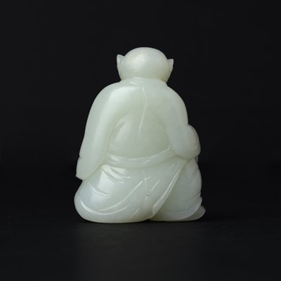 Lot 89 - A Chinese pale celadon jade 'zodiac' carving, Qing dynasty