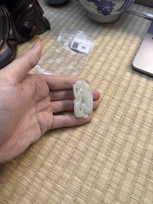 Lot 95 - A Chinese jade 'monkeys' carving, Qing dynasty