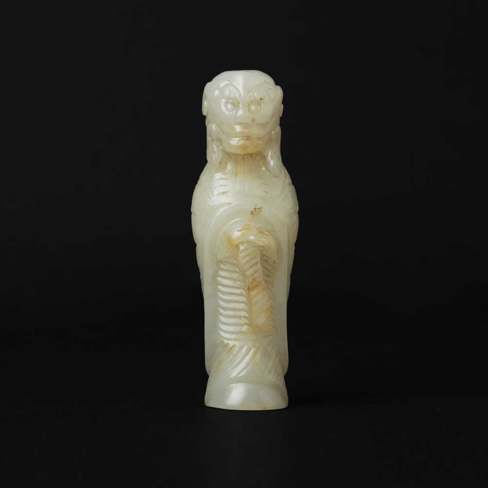 Lot 90 - A Chinese celadon jade 'Dragon King' carving, Qing dynasty, 19th century
