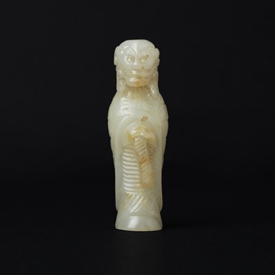 Lot 90 - A Chinese celadon jade 'Dragon King' carving, Qing dynasty, 19th century