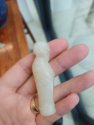 Lot 90 - A Chinese celadon jade 'Dragon King' carving, Qing dynasty, 19th century