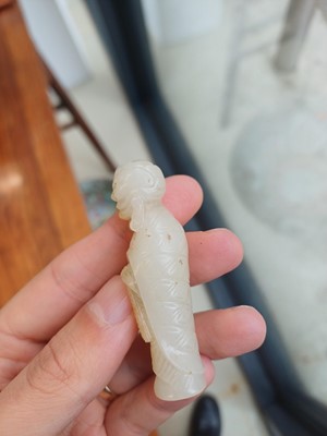 Lot 90 - A Chinese celadon jade 'Dragon King' carving, Qing dynasty, 19th century