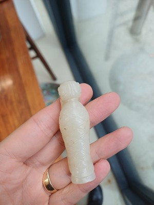 Lot 90 - A Chinese celadon jade 'Dragon King' carving, Qing dynasty, 19th century