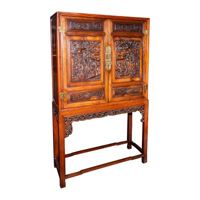 Lot 129 - An early 20th century Chinese hardwood cabinet