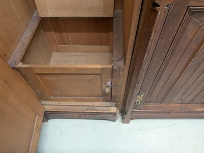 Lot 65 - A Pugin style ecclesiastical four door oak linen cupboard