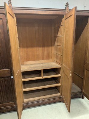 Lot 65 - A Pugin style ecclesiastical four door oak linen cupboard