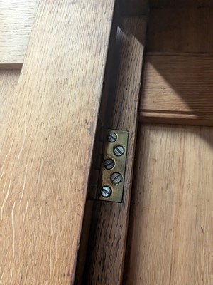 Lot 65 - A Pugin style ecclesiastical four door oak linen cupboard