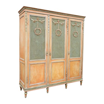 Lot 102 - A French Louis XVI style painted triple armoire