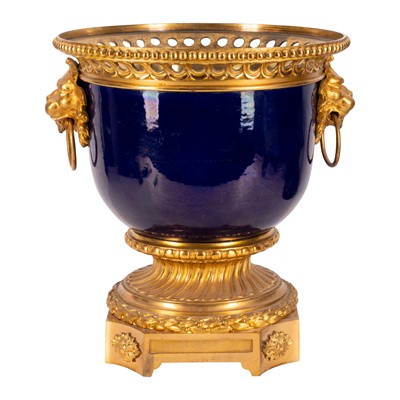 Lot 7 - A French Sèvres style cobalt blue porcelain and ormolu urn