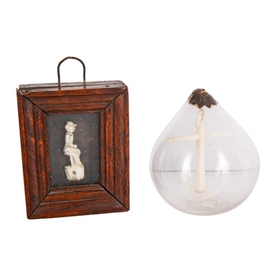 Lot 480 - A 19th Century Napoleonic Prisoner of War bone anchor within a handblown teardrop glass