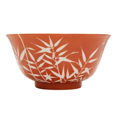 Lot 611 - A Chinese reverse-decorated coral-glazed 'bamboo' bowl, 20th century