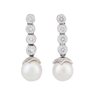 Lot 86 - A pair of pearl and diamond pendent earrings