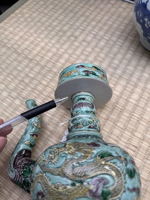 Lot 58 - A Chinese famille-verte 'dragon' Tibetan-style ewer, penba hu, 18th/19th century