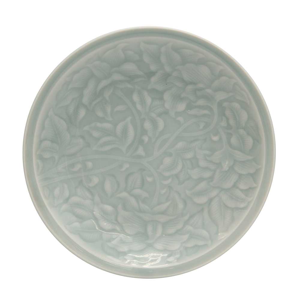 Lot 97 - A Japanese celadon-glazed 'floral' dish, 20th century, Showa period
