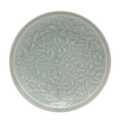 Lot 829 - A Japanese celadon-glazed 'floral' dish, 20th century, Showa period