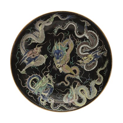 Lot 334 - A Chinese famille-noire 'dragons' dish, 19th/20th century
