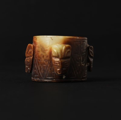 Lot 154 - A Chinese archaistic russet jade cong, 18th/19th century