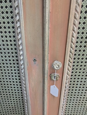 Lot 42 - A French Louis XVI style painted press cupboard