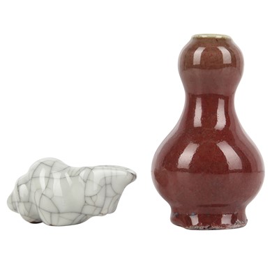 Lot 512 - A small Chinese red-glazed vase and a Ge-type water pot, 19th - 20th century