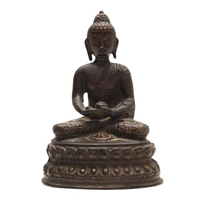 Lot 532 - A Sino-Tibetan bronze figure of Buddha Shakyamuni, 19th - 20th century