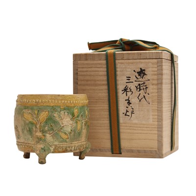 Lot 672 - A Chinese sancai 'lotus scroll' tripod censer, Ming dynasty