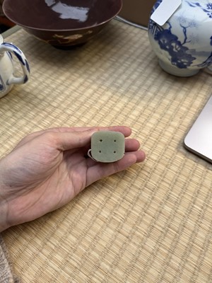 Lot 80 - A Chinese reticulated celadon jade 'egret' finial, Yuan/Ming dynasty