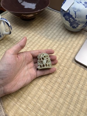 Lot 80 - A Chinese reticulated celadon jade 'egret' finial, Yuan/Ming dynasty