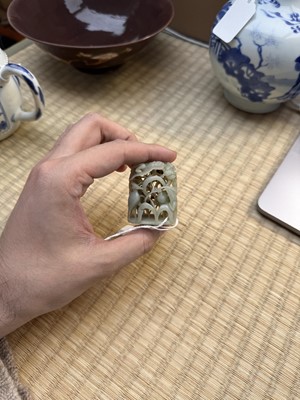 Lot 80 - A Chinese reticulated celadon jade 'egret' finial, Yuan/Ming dynasty