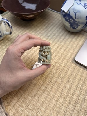 Lot 80 - A Chinese reticulated celadon jade 'egret' finial, Yuan/Ming dynasty