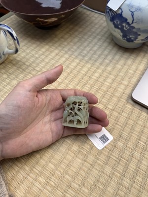 Lot 80 - A Chinese reticulated celadon jade 'egret' finial, Yuan/Ming dynasty