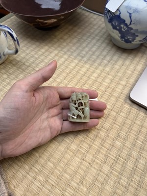 Lot 80 - A Chinese reticulated celadon jade 'egret' finial, Yuan/Ming dynasty