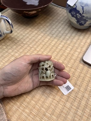 Lot 80 - A Chinese reticulated celadon jade 'egret' finial, Yuan/Ming dynasty