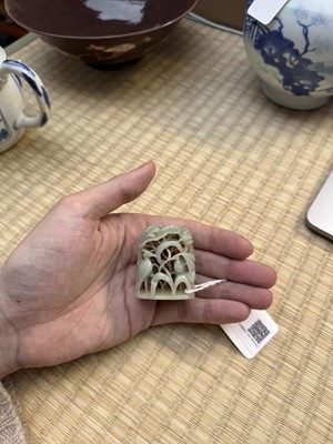 Lot 80 - A Chinese reticulated celadon jade 'egret' finial, Yuan/Ming dynasty