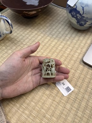 Lot 80 - A Chinese reticulated celadon jade 'egret' finial, Yuan/Ming dynasty