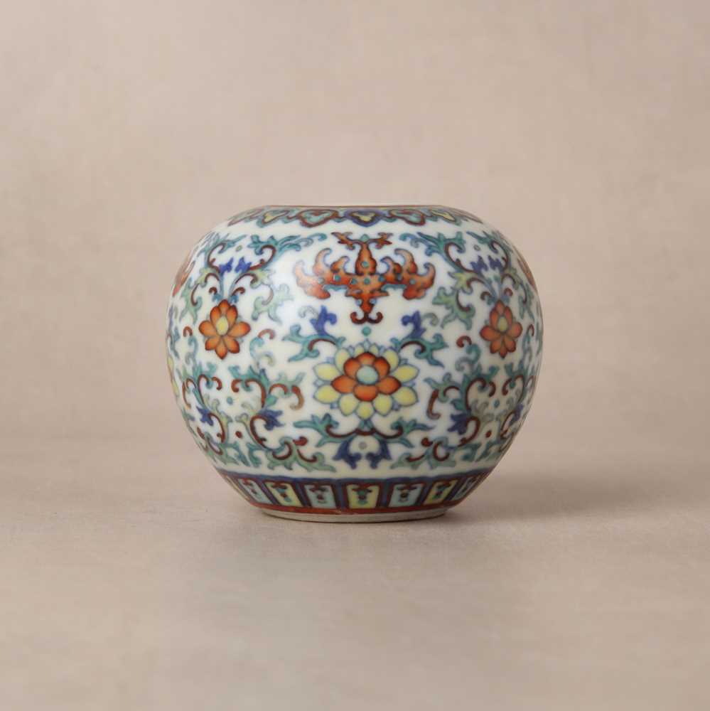 64 - ♦ A fine and rare Chinese doucai 'lotus' water pot, Qing dynasty, Qianlong mark and of the period