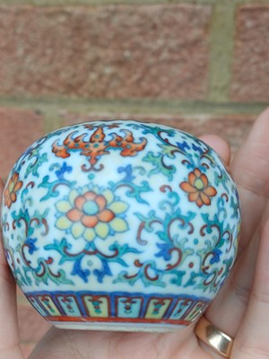 Lot 64 - ♦ A fine and rare Chinese doucai 'lotus' water pot, Qing dynasty, Qianlong mark and of the period