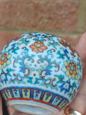 Lot 64 - ♦ A fine and rare Chinese doucai 'lotus' water pot, Qing dynasty, Qianlong mark and of the period