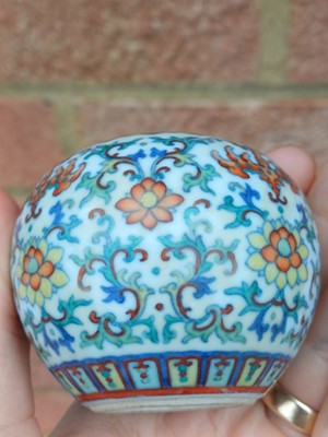 Lot 64 - ♦ A fine and rare Chinese doucai 'lotus' water pot, Qing dynasty, Qianlong mark and of the period