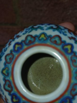 Lot 64 - ♦ A fine and rare Chinese doucai 'lotus' water pot, Qing dynasty, Qianlong mark and of the period