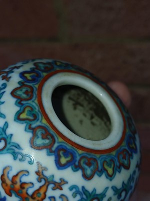 Lot 64 - ♦ A fine and rare Chinese doucai 'lotus' water pot, Qing dynasty, Qianlong mark and of the period