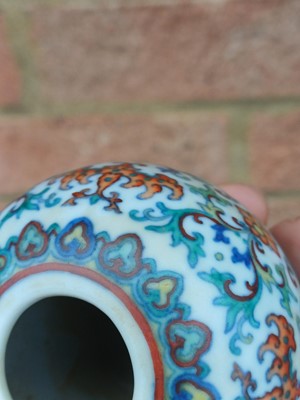 Lot 64 - ♦ A fine and rare Chinese doucai 'lotus' water pot, Qing dynasty, Qianlong mark and of the period