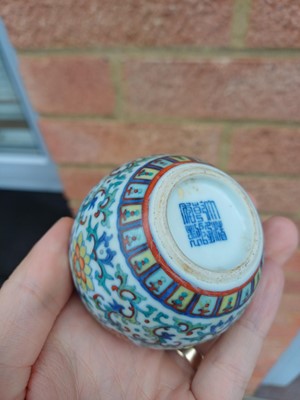 Lot 64 - ♦ A fine and rare Chinese doucai 'lotus' water pot, Qing dynasty, Qianlong mark and of the period