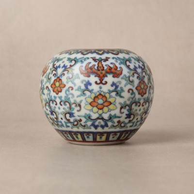 Lot 64 - ♦ A fine and rare Chinese doucai 'lotus' water pot, Qing dynasty, Qianlong mark and of the period