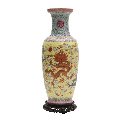 Lot 347 - A Chinese famille-rose yellow-ground 'dragons' vase, Republic period