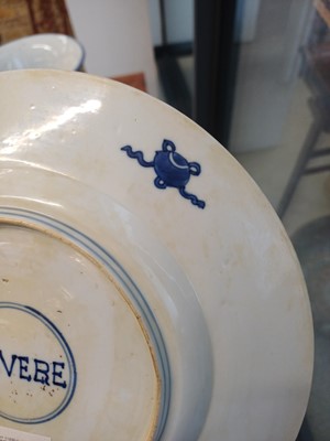 Lot 6 - A rare Chinese blue and white 'figural' dish, Qing dynasty, Kangxi period, 'BEVERE' mark