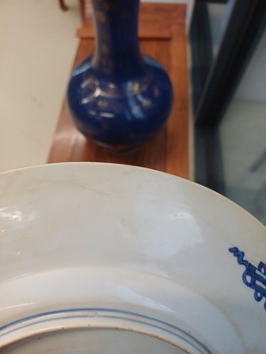 Lot 6 - A rare Chinese blue and white 'figural' dish, Qing dynasty, Kangxi period, 'BEVERE' mark