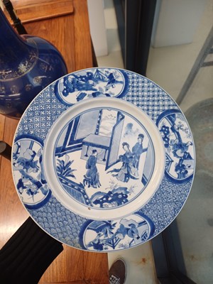 Lot 6 - A rare Chinese blue and white 'figural' dish, Qing dynasty, Kangxi period, 'BEVERE' mark